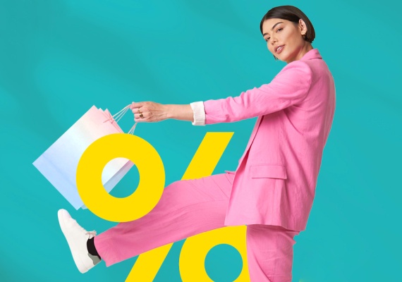  woman wearing pink with shopping bags